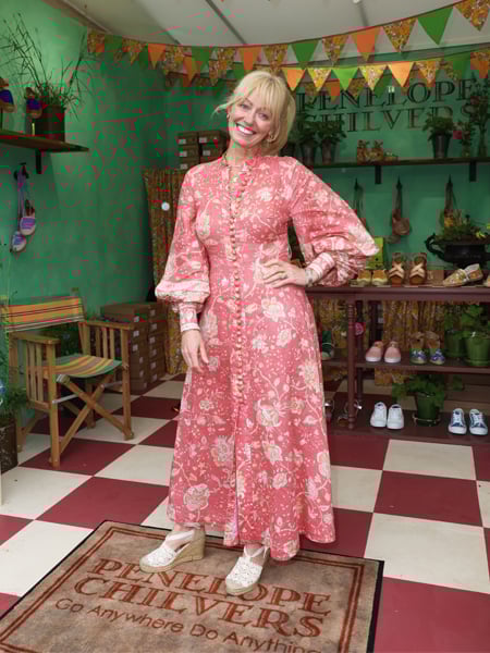 A woman wearing Lace Espadrilles.